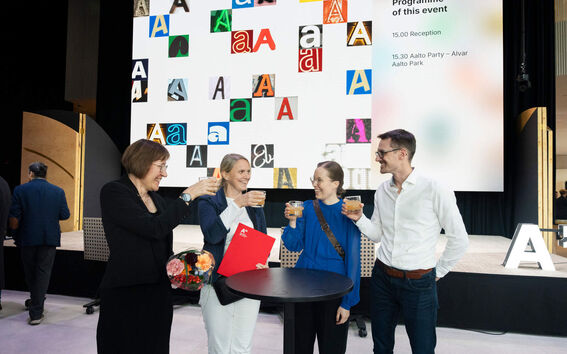 Employees celebrating award received at the opening ceremony of the academic year 